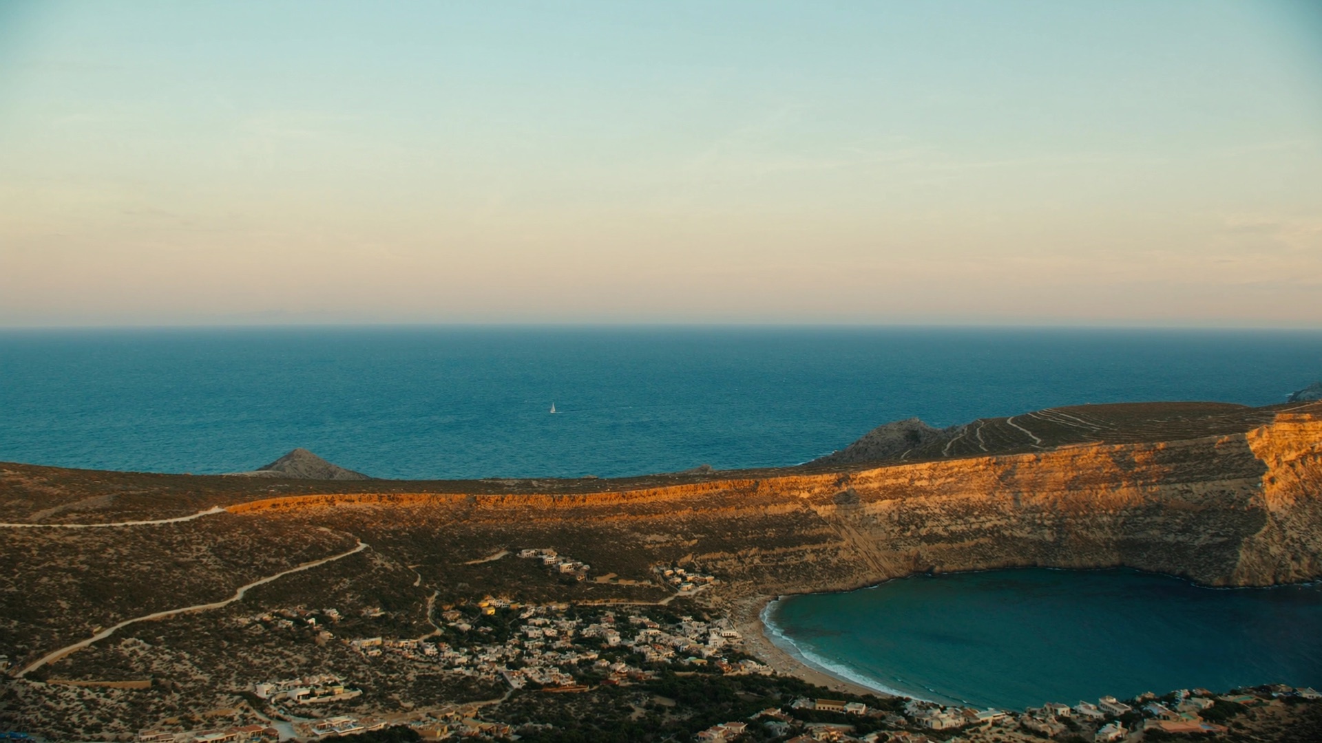 Aerial view of a Mediterranean coastline at golden hour